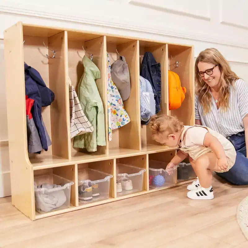 Vestiaire enfant 5 sections avec banc et 5 bacs de rangement à façade évidée