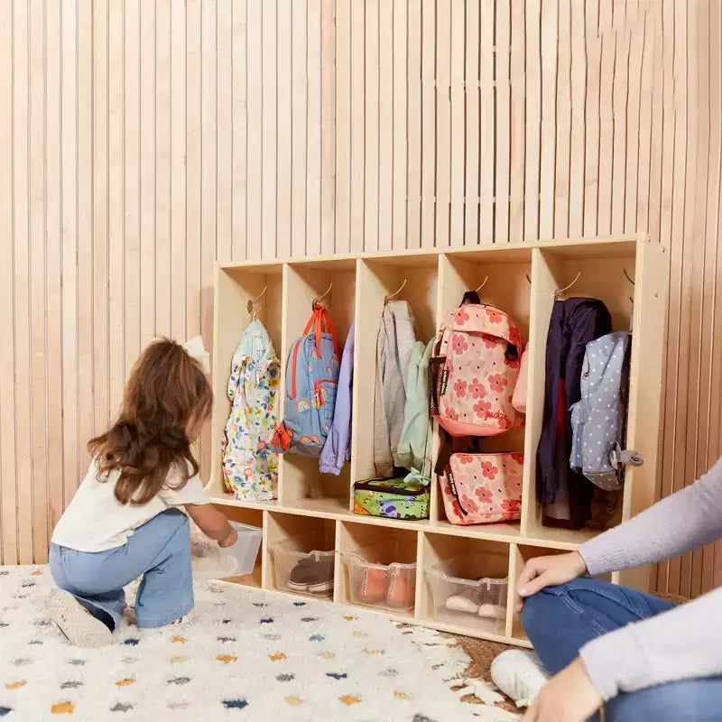 Vestiaire enfant 5 sections avec banc et 5 bacs de rangement à façade évidée