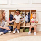 Vestiaire enfant 5 sections avec banc et 5 bacs de rangement à façade évidée