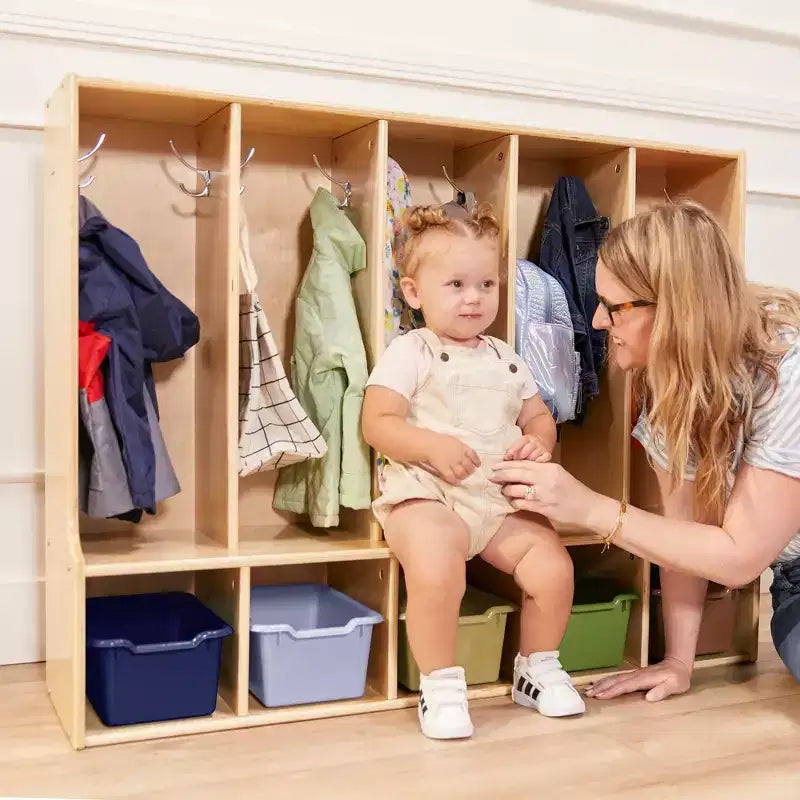 Vestiaire enfant 5 sections avec banc et 5 bacs de rangement à façade évidée